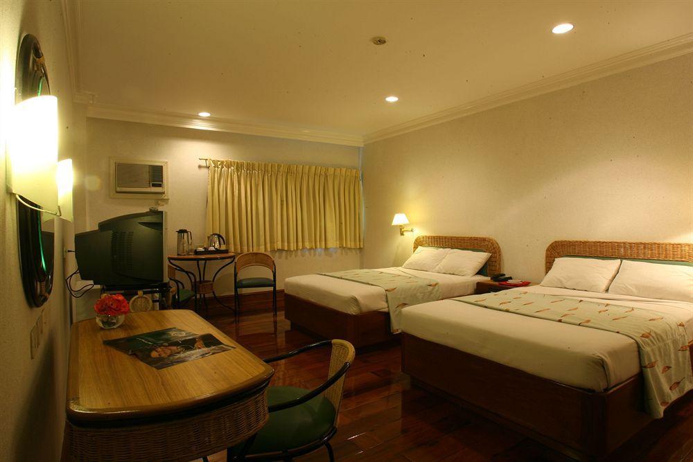 The Legend Palawan Hotel Puerto Princesa Exterior foto